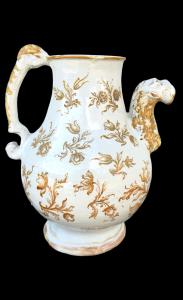 Versatoio in maiolica con beccuccio a forma di testa animale e decoro floreale.Manifattura Boselli.Savona.