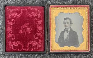 Daguerreotype inside original container with male figure.