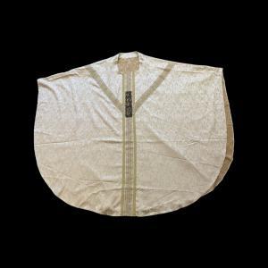 Dalmatic priestly vestment apparel.