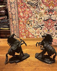 Pair of bronze horses signed Guillaume Cousteau, 19th century.