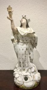 Porcelain veilleuse teapot with figure of a Saint holding a book and holy water font. Jacob Petit model. France.