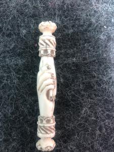Ivory needle case with hands, Europe.