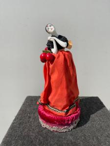 Porcelain powder box 'half doll' with a pierrot figure. France.