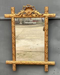 Carved and gilded mirror