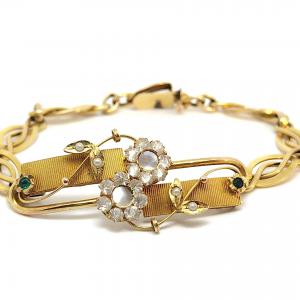 Bracciale in oro con smeraldi e diamanti