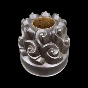 Embossed copper pudding mold with spiral shapes. Italy.