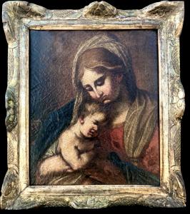 Dipinto olio su tela raffigurante Madonna con Gesu’Bambino.Scuola emiliana.
