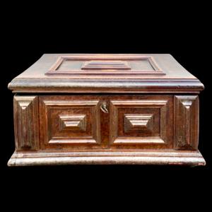 Walnut box shaped like a chest with removable compartments and a mirror inside.