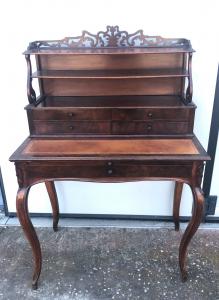 Walnut writing desk with leather-covered top and sliding second level. Louis Philippe period.