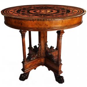 Elm burl center table, ebony and precious wood inlay, lion feet. Tuscany, second half of the 19th century