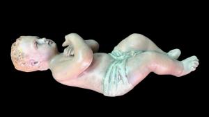 Scultura da presepe Gesu’Bambino in terracotta.