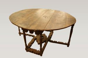 Tavolo consolle ovale con alette apribile spagnolo del 1600 in noce stile Luigi XIV