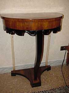Crescent-shaped console table