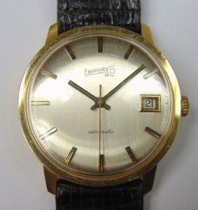 Orologio da polso in oro Eberhard automatico con datario. Anno 1975 . Con scatola e garanzia