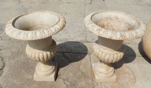 Par de vasos de ferro fundido