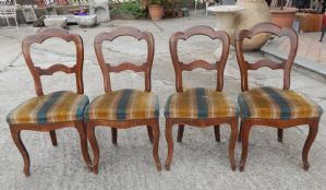Four walnut chairs