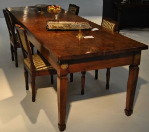Walnut wood table with truncated pyramid legs and a collar under the top band, two drawers on one side, Lombard manufacture from the early 19th century, 82 x 293 x 92 cm.