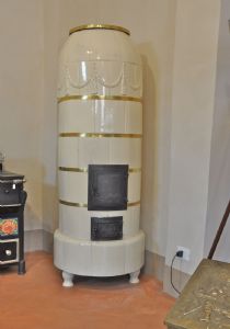 Large cream-colored round stove