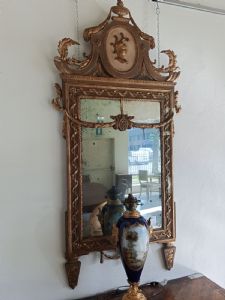 Louis XVI rectangular lacquered and gilded mirror with friezes