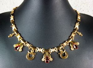 Gold necklace with red stones, boxed. 1940s