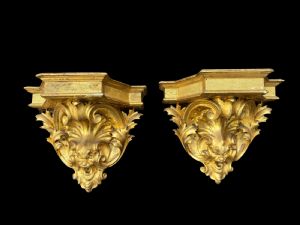 Pair of carved and gilded wood corbels