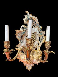 Polychrome ceramic sconces with bronze arms