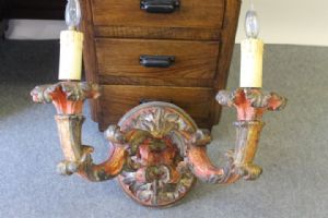 Antique lacquered wall lamp with two arms, Baroque period circa 1650.