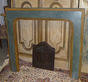 Tempera painted fireplace made from a 18th-century Venetian frame.