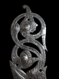 Splendid pierced and engraved wrought iron escutcheon with knob, 17th century.
