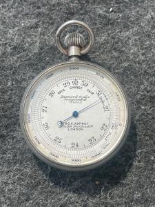 Silver travel barometer. Brand: c & g.e.asprey.London.