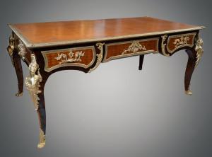 Antique French Napoleon III desk in fine exotic wood with gilded bronze inlays. France 19th century.