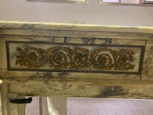 Cala Catta marble fireplace with bronze inlays, 165x35x108h
