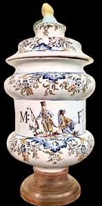Large majolica "albarello" mustard jar decorated with two soldiers and stylized rocaille and floral motifs. Marinoni manufacture, Angarano.