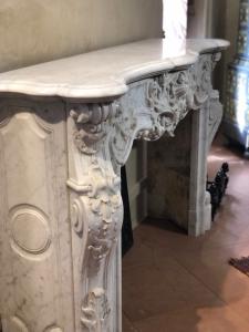Large French fireplace in white Carrara marble