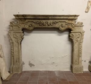 Baroque period stone fireplace