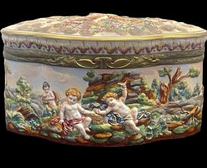 Porcelain box with 'story-telling bas-relief' decoration. Ginori manufactory. Florence.