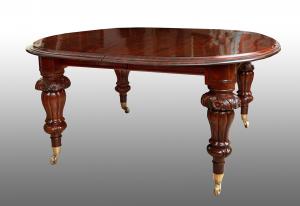 Mesa antiga extensível Vitoriana Inglesa em mogno maciço. Período do século XIX.