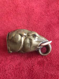Brass matchbox holder depicting an elephant's head.