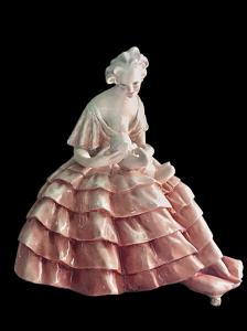 Scultura in ceramica raffigurante madre che allatta bimbo.Manifattura di Guido Cacciapuoti.