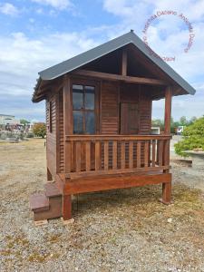 Rustic wooden house with veranda