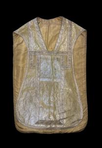 Priestly sacred vestment Chasuble with silver thread decorations.