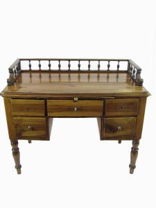 Mid 19th century walnut writing knee hole desk