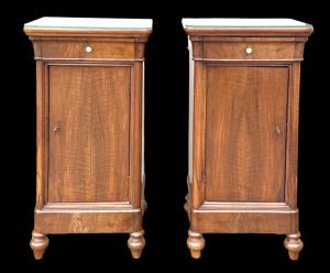 Pair of walnut bedside tables with drawer and internal shelf.