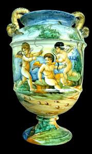Majolica vase with serpentine handles and storied decoration. Cantagalli Manufacture. Florence.