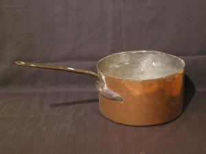 Antique copper saucepan