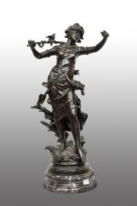 Scultura antica in bronzo patinato raffigurante la "Nimphe de bois" firmata "Louis Moreau" poggiante su base in marmo rosso levanto.Francia XIX secolo.