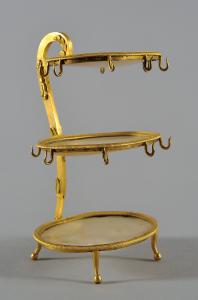 Piccolo etagere a tre ripiani in bronzo dorato e madreperla Francia