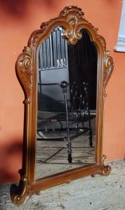 Large lacquered and gilded mirror