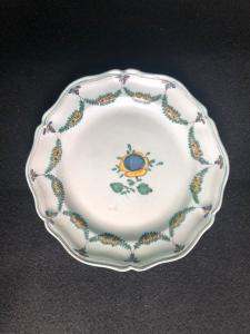 Majolica plate with floral decoration and festoons. Cerreto Sannita.