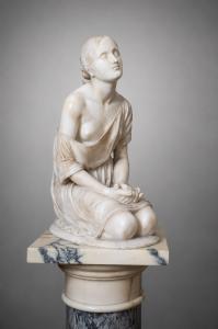 Antique alabaster sculpture depicting a kneeling female figure. Lombardy, 19th century.